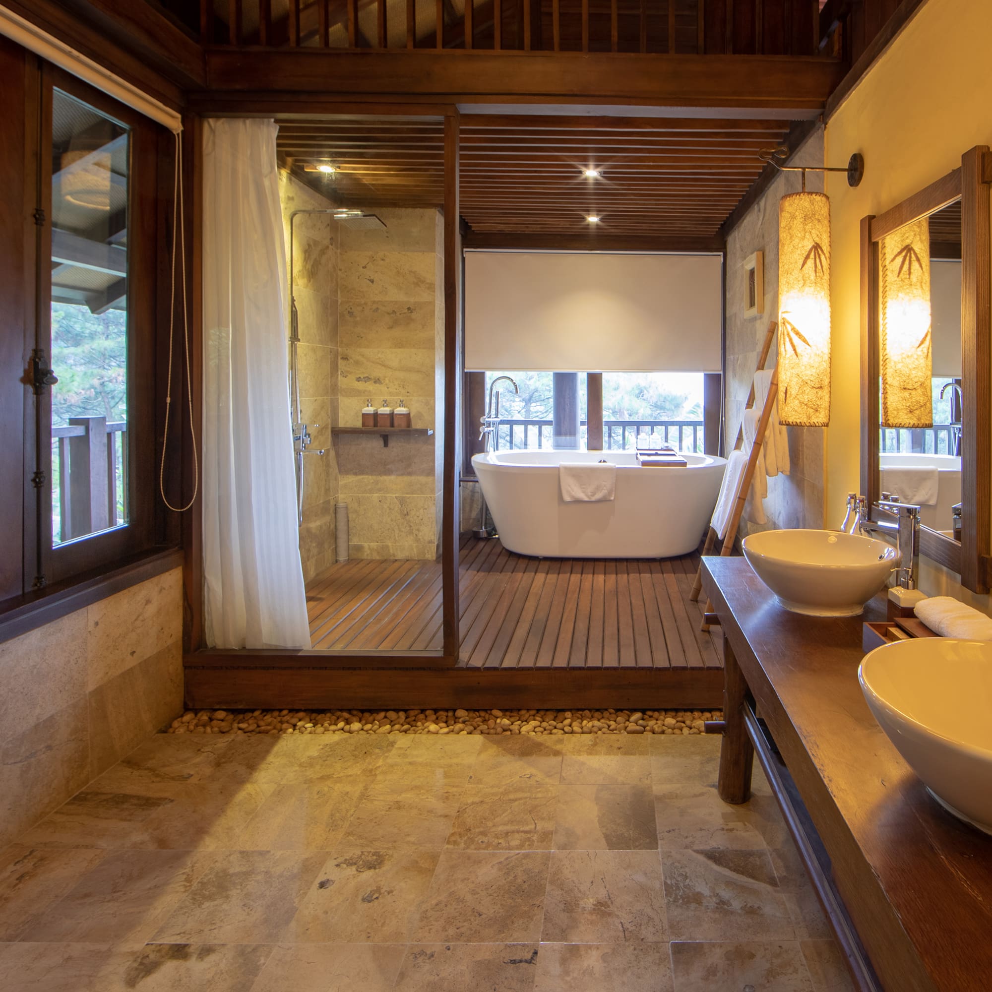 a bathroom with a tub and a shower