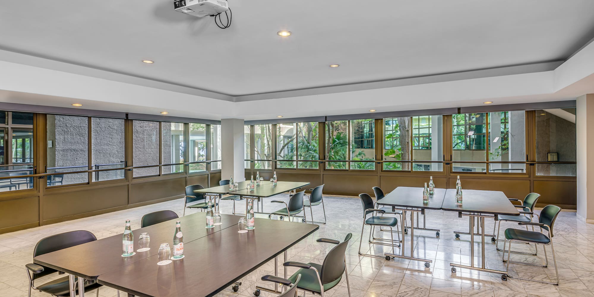 a room with tables and chairs