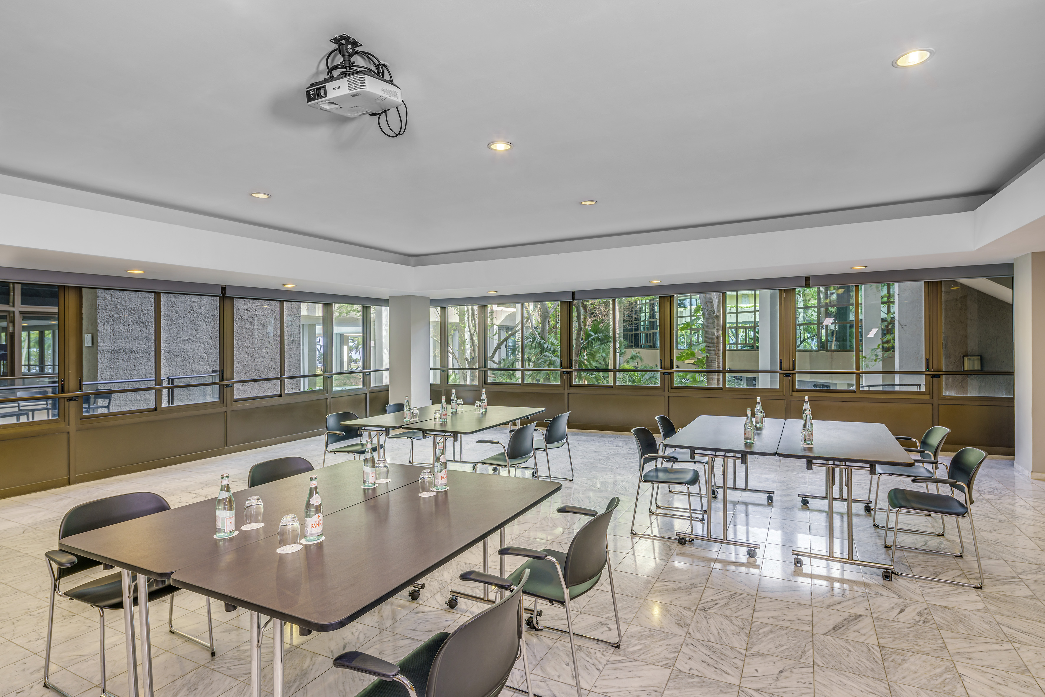 a room with tables and chairs