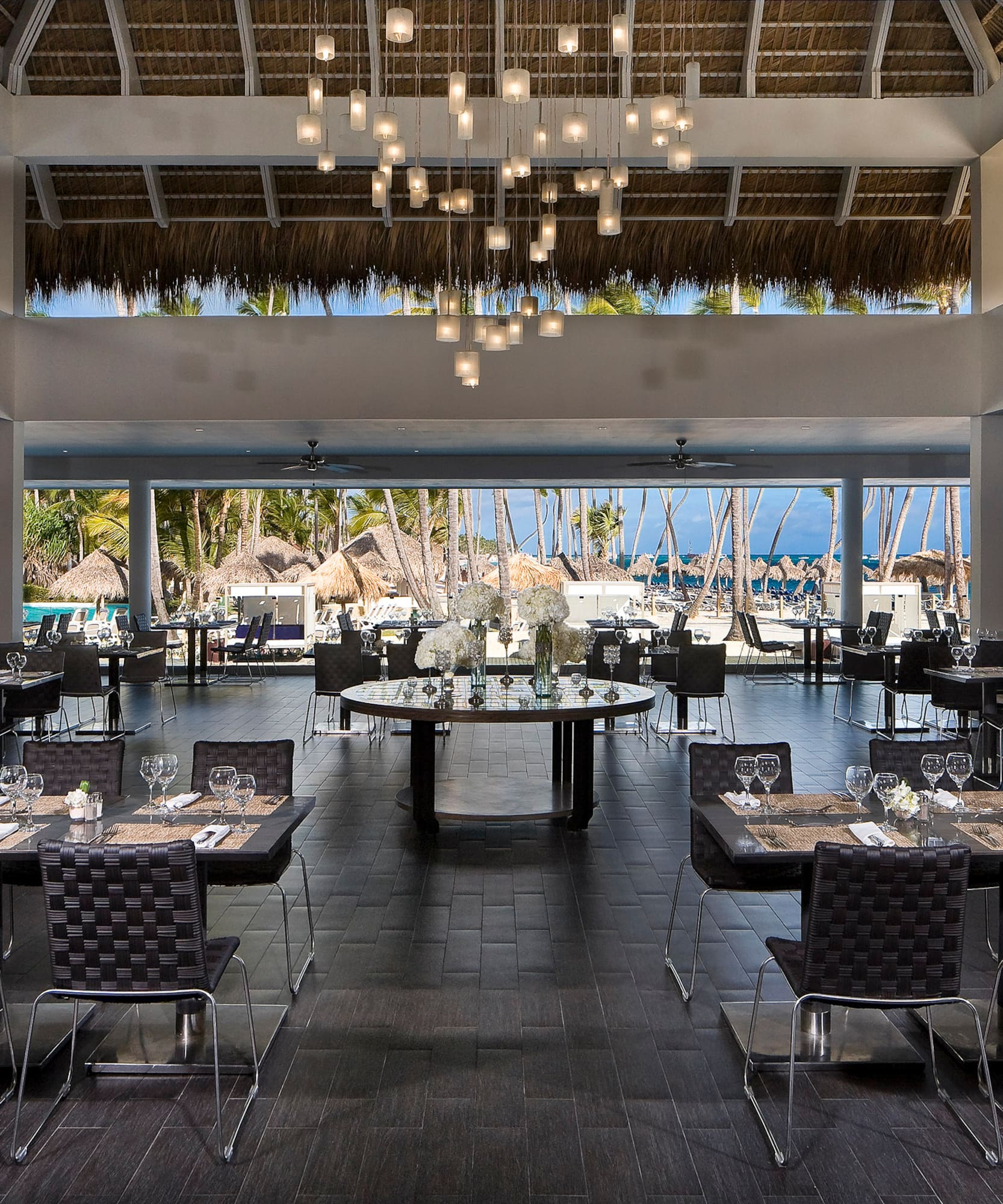 a restaurant with tables and chairs