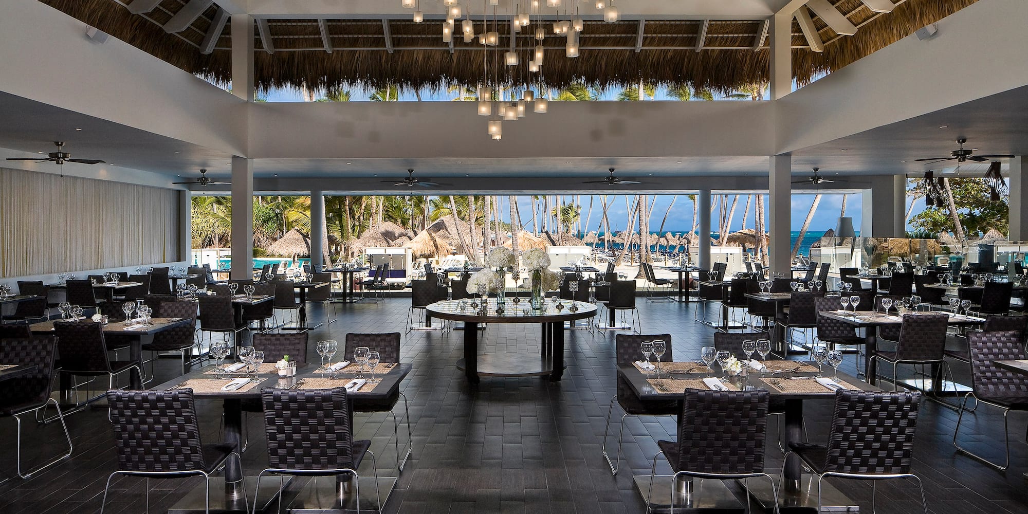 a restaurant with tables and chairs