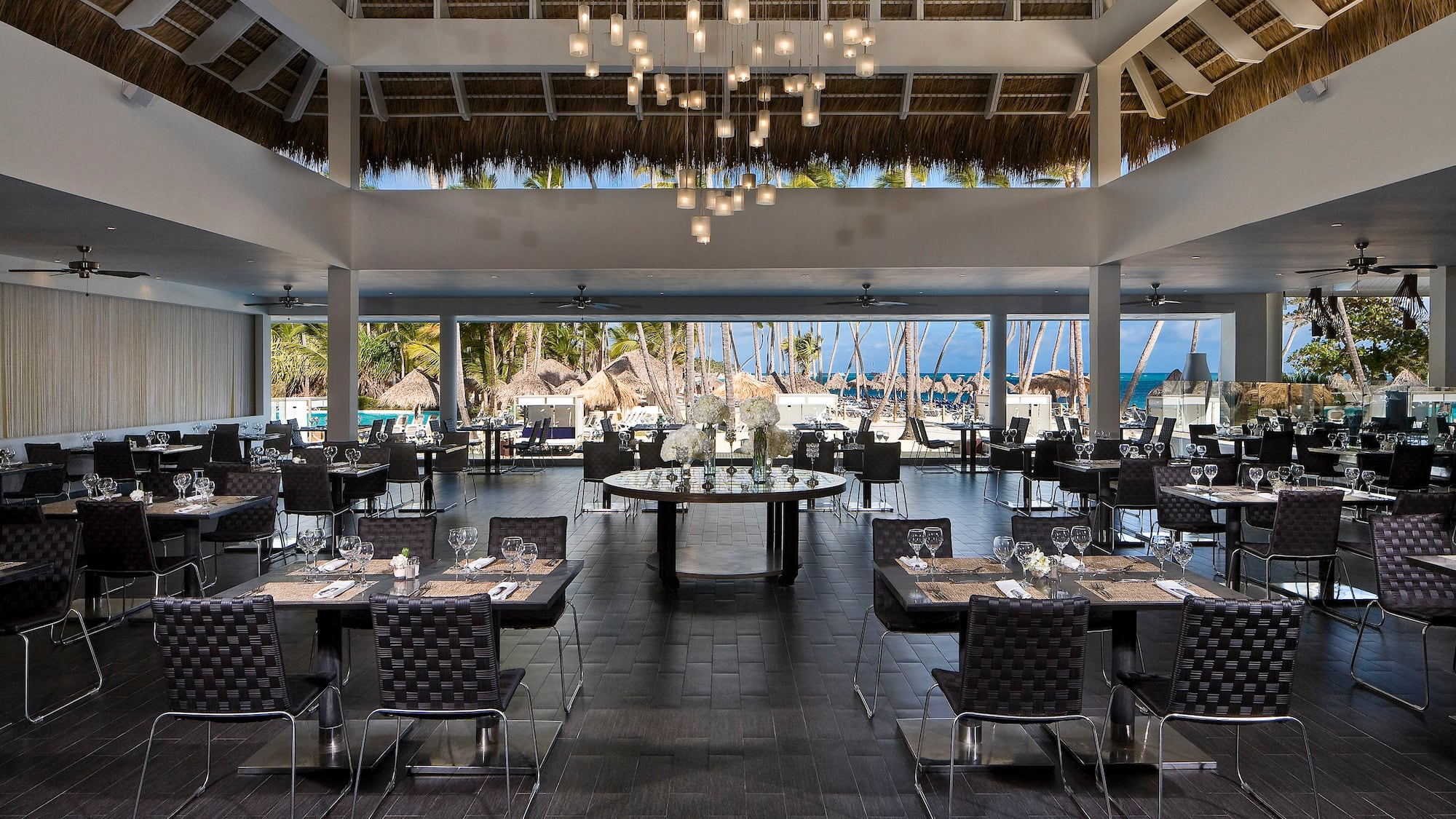 a restaurant with tables and chairs