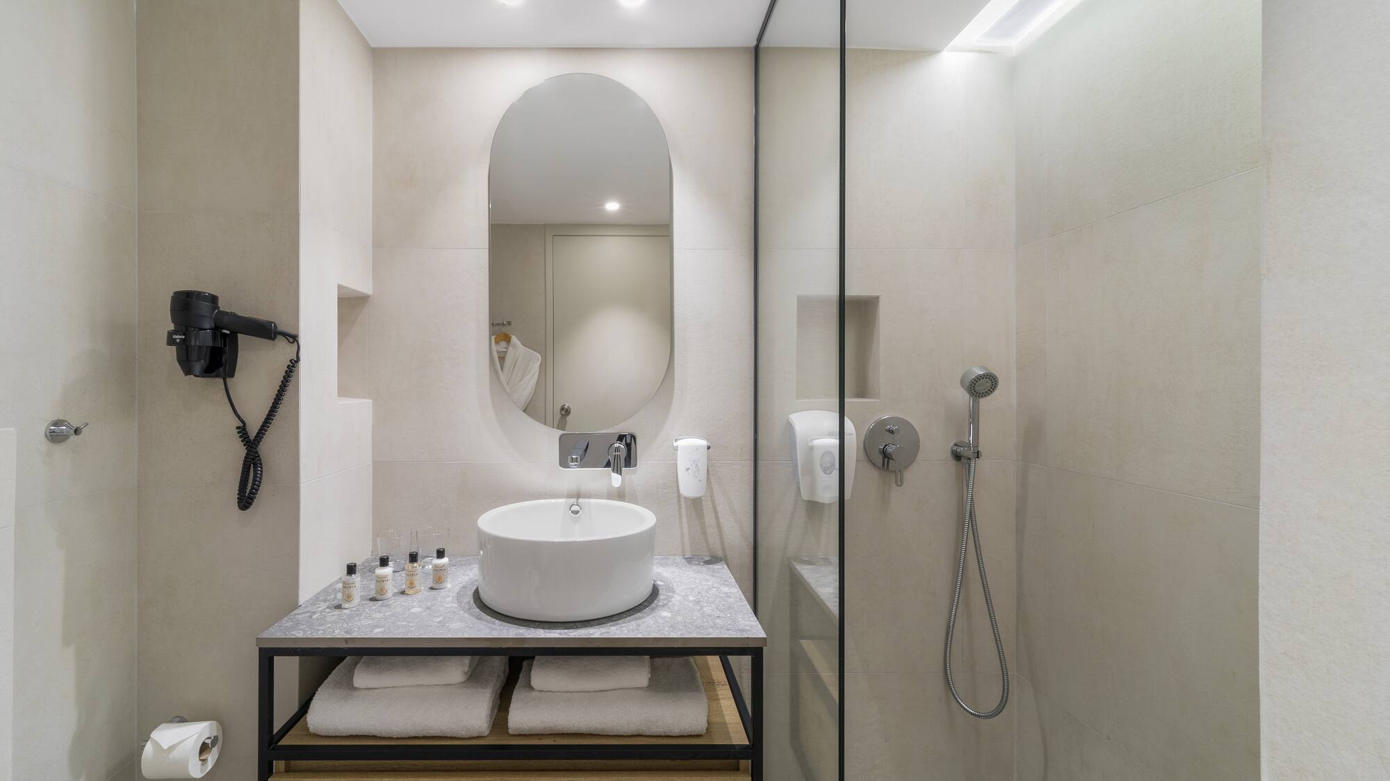 a bathroom with a sink and shower