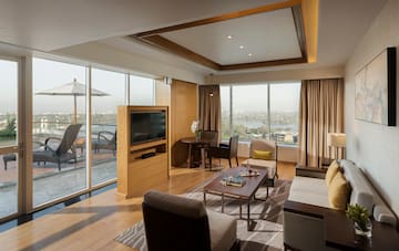 a living room with a television and a couch
