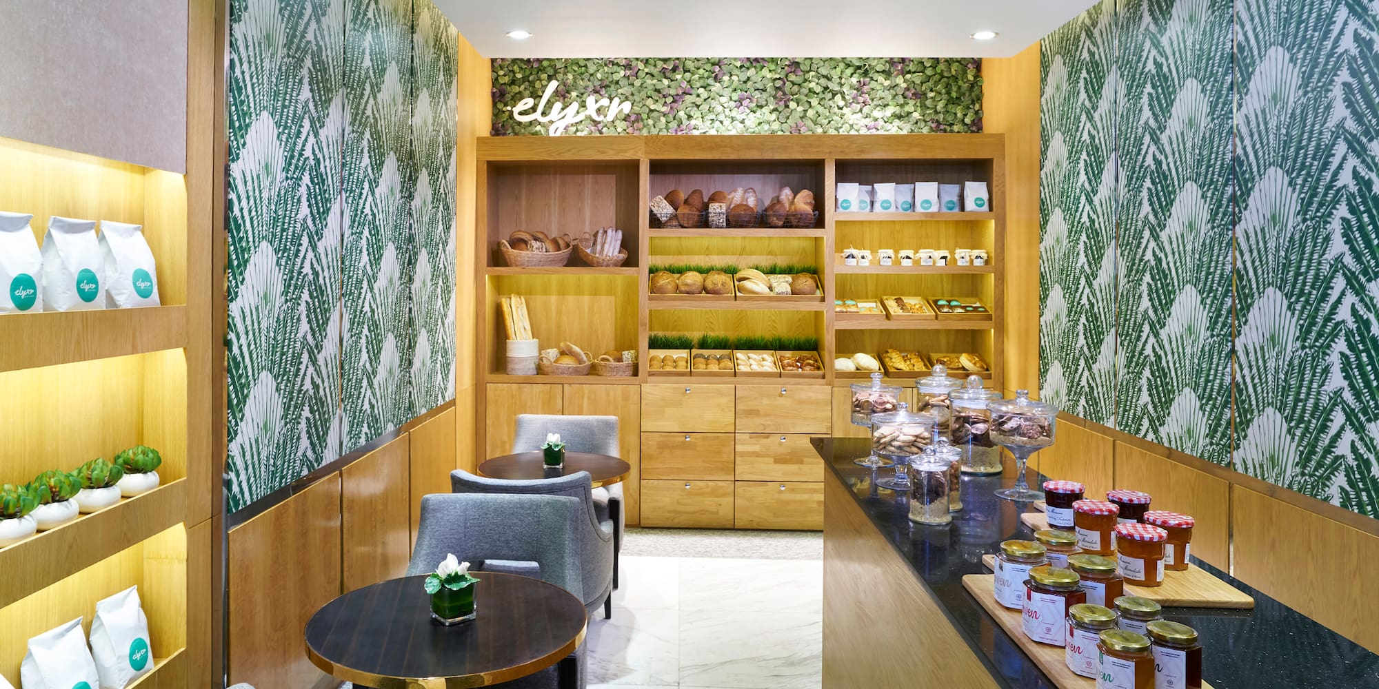 a room with a counter and shelves with food