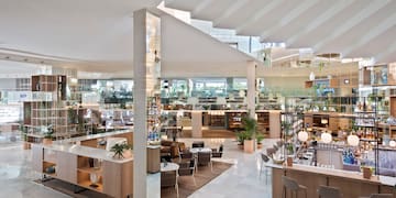 a large room with tables and chairs