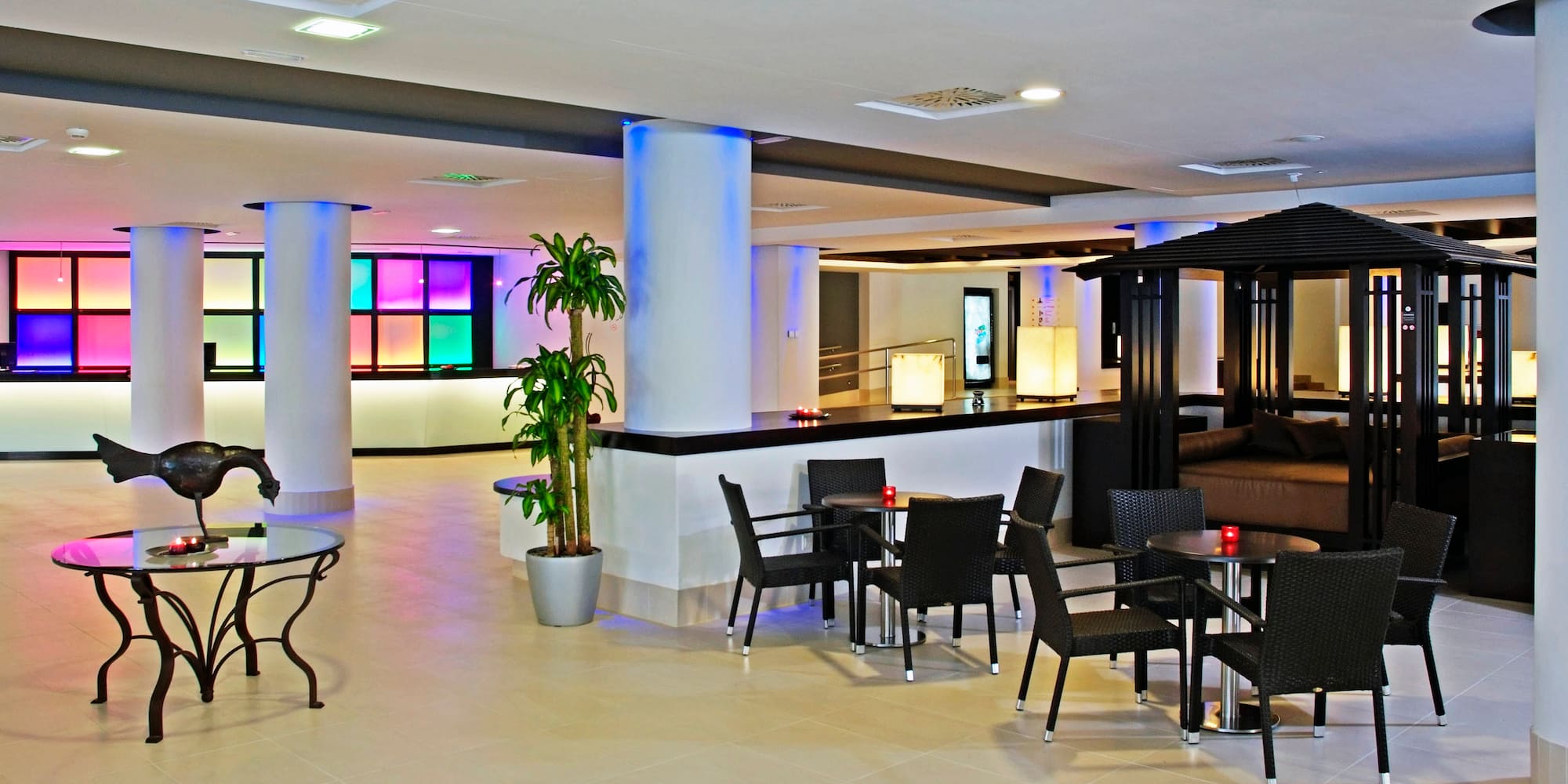 a room with a table and chairs