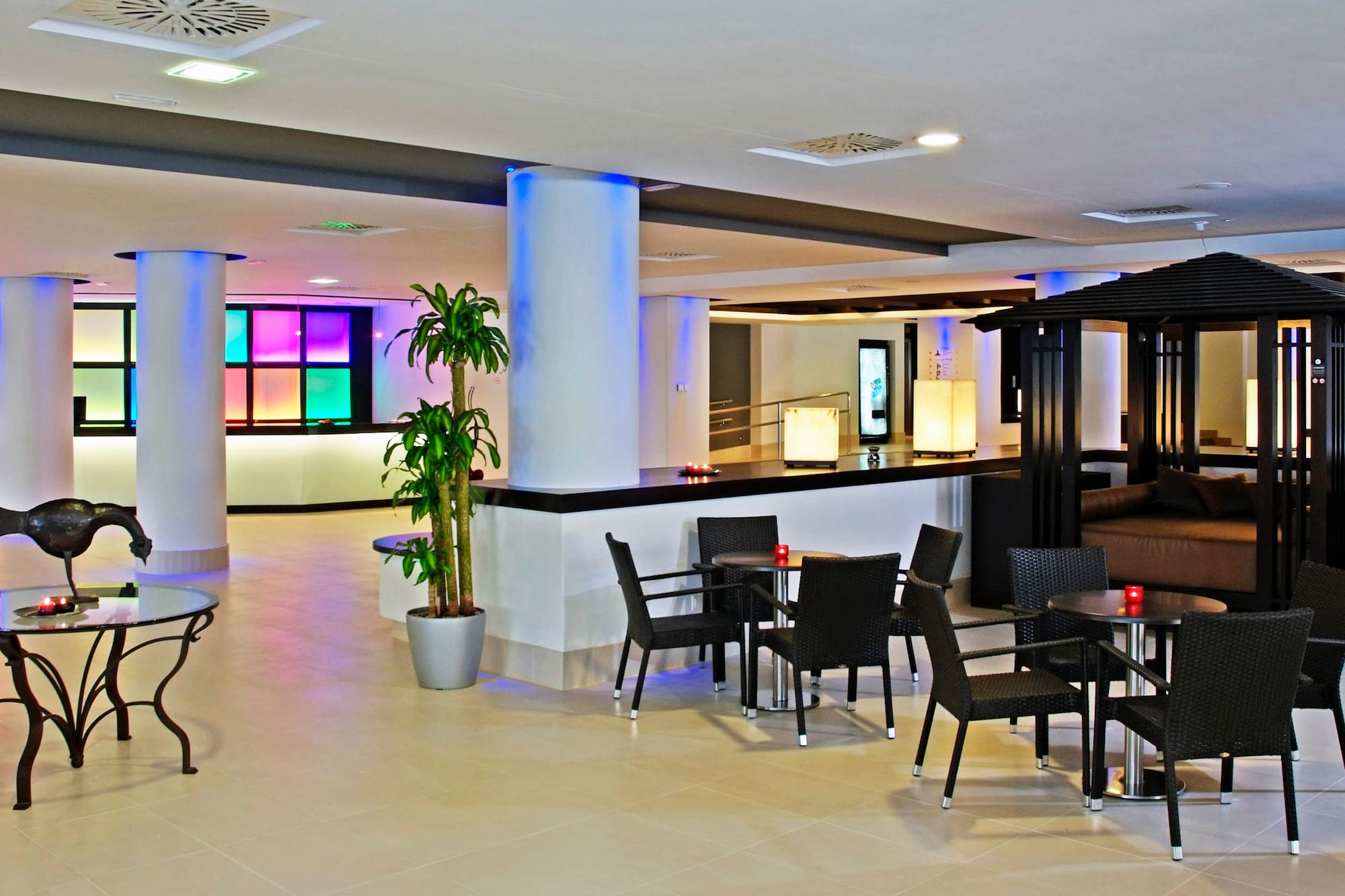 a room with a table and chairs