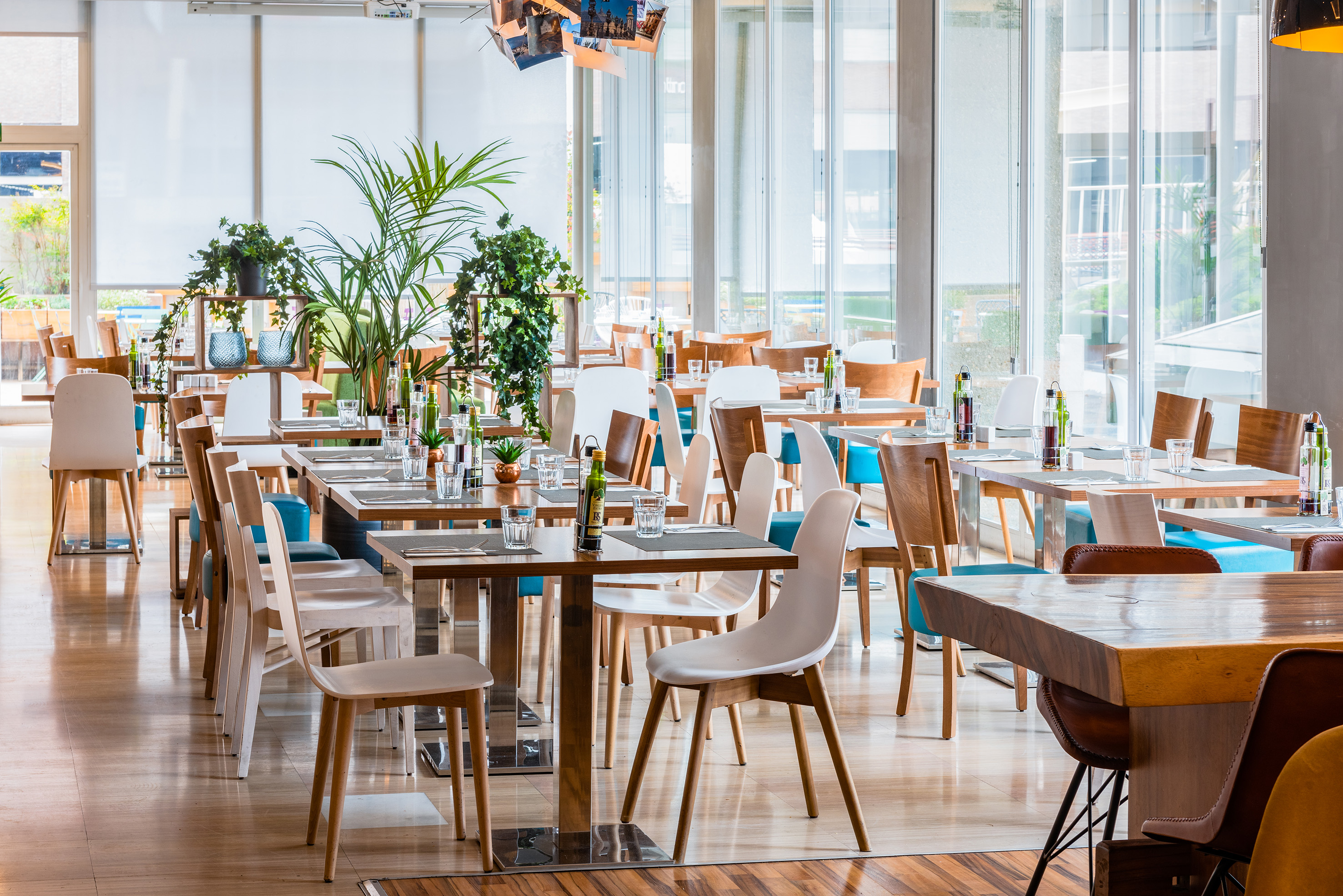 a restaurant with tables and chairs