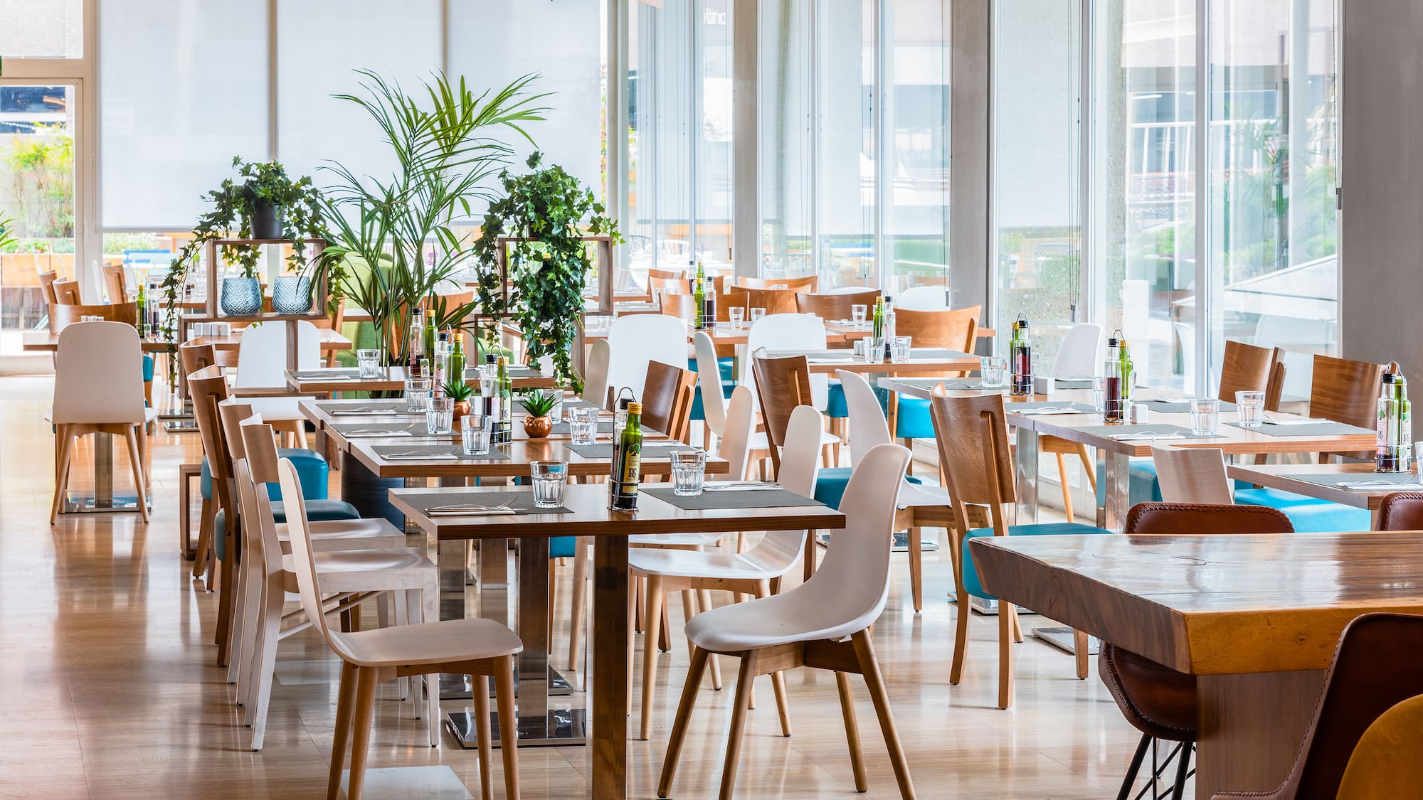 a restaurant with tables and chairs
