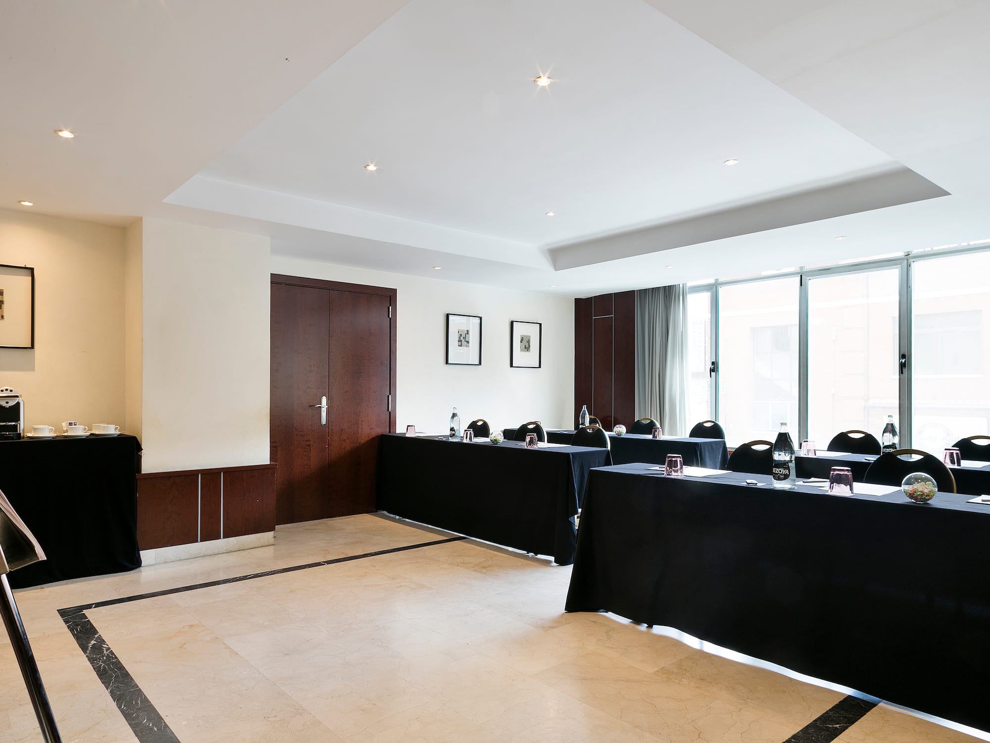 a room with tables and chairs