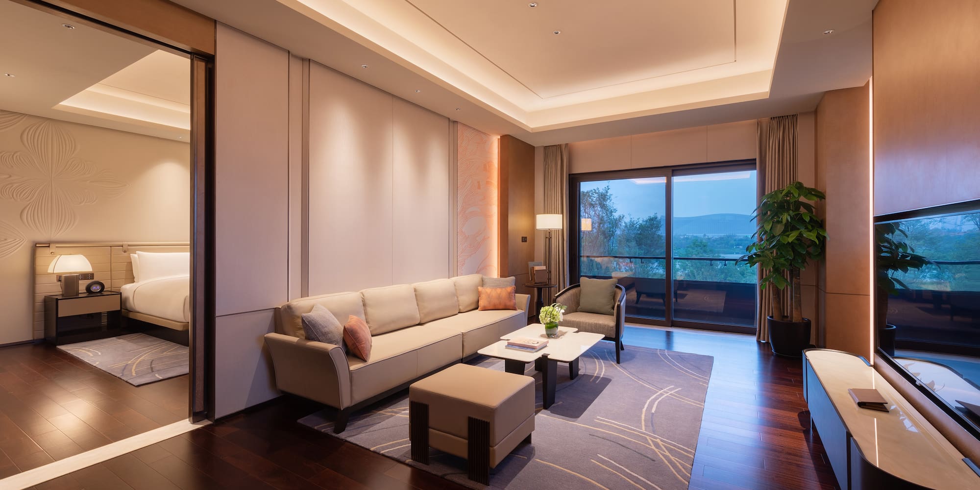 a living room with a couch and a tv