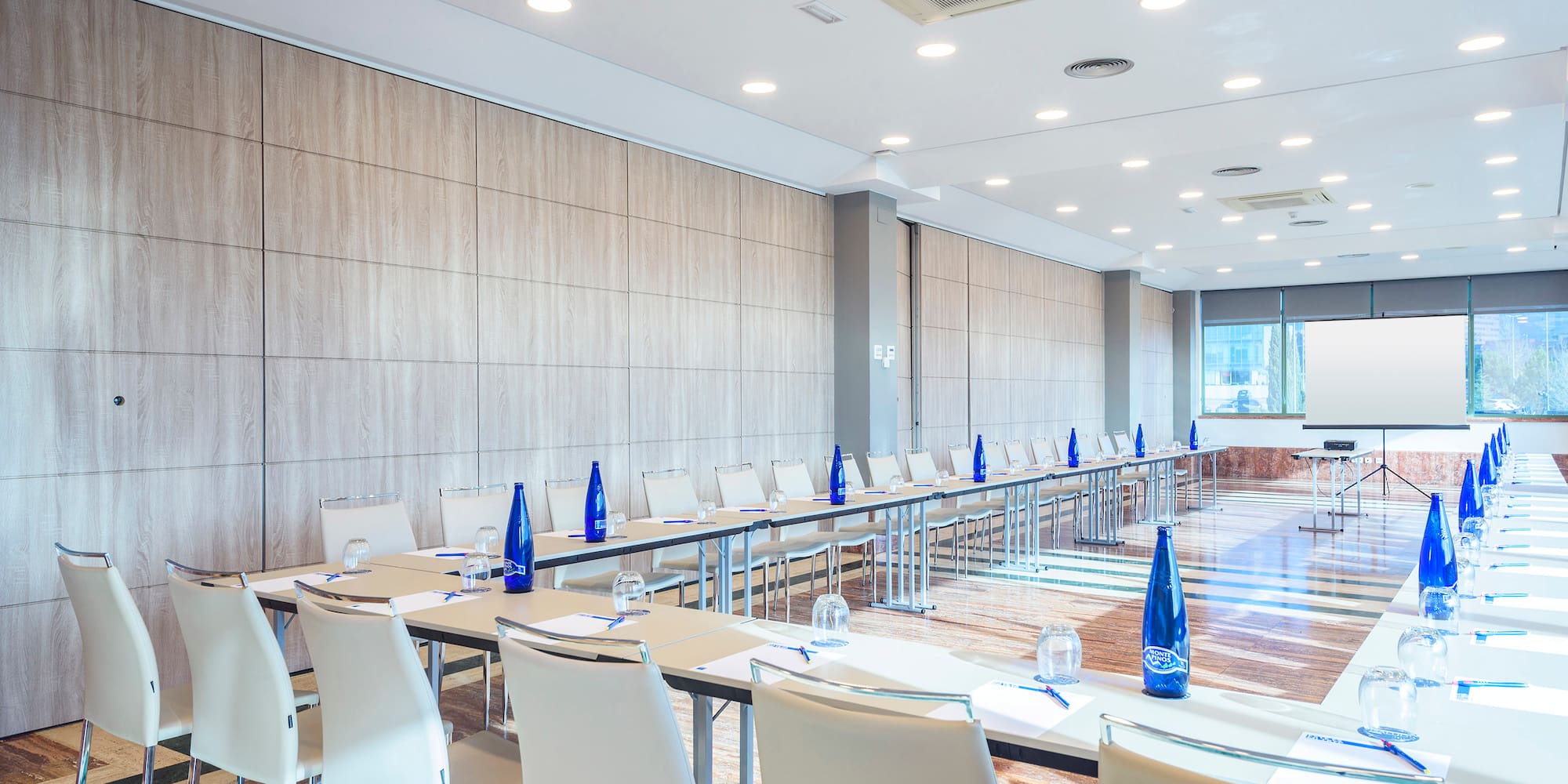 a room with tables and chairs