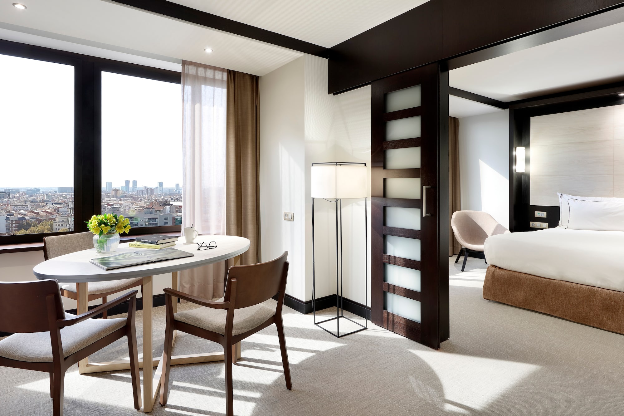 a room with a table and chairs