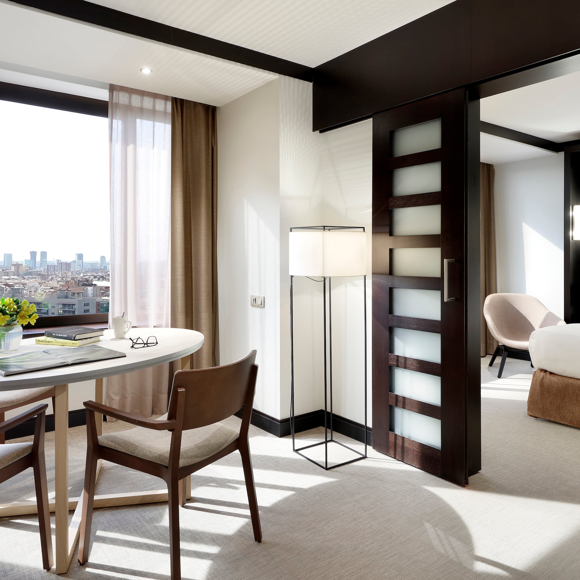 a room with a table and chairs