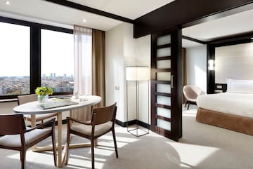 a room with a table and chairs