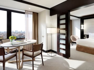 a room with a table and chairs