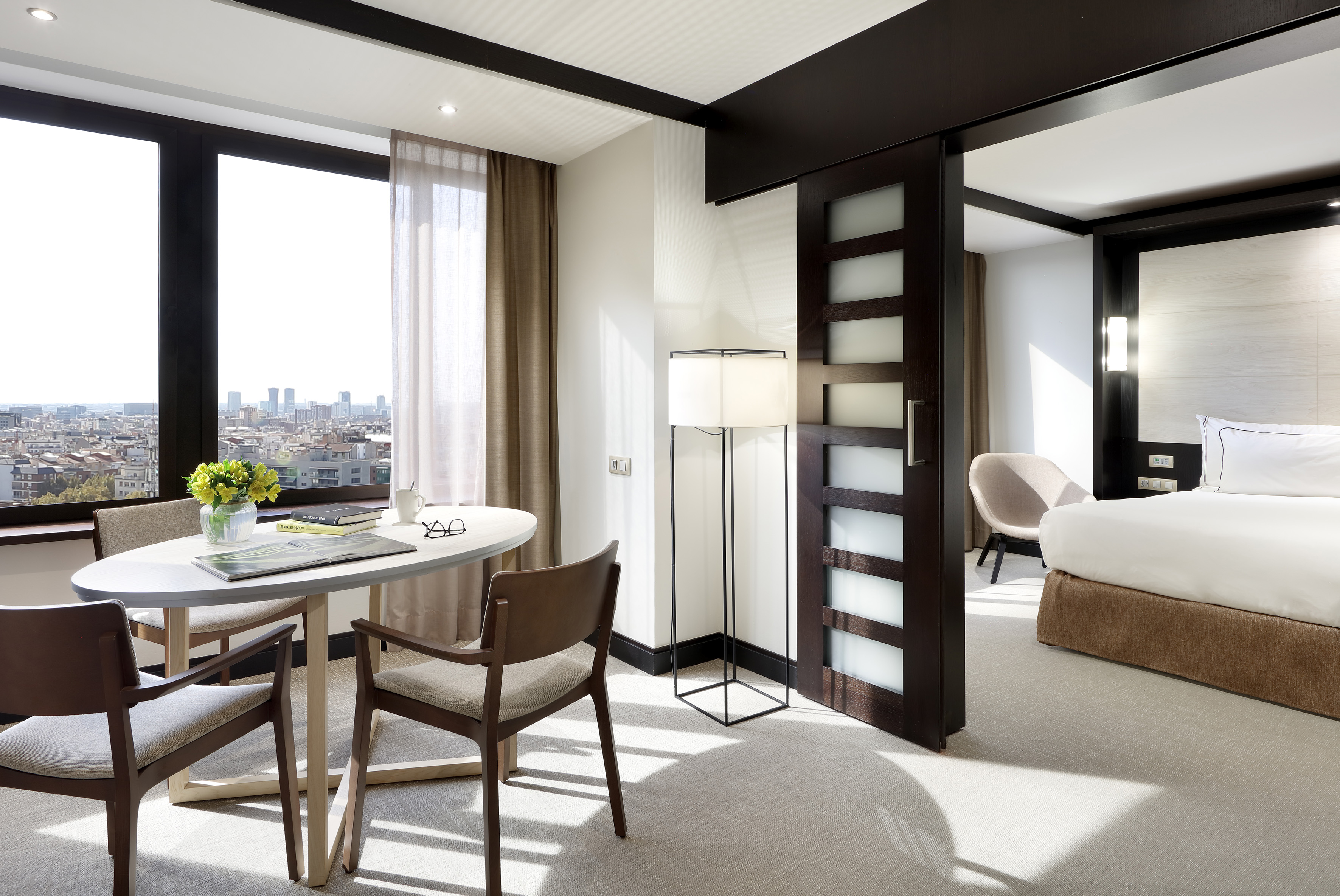 a room with a table and chairs