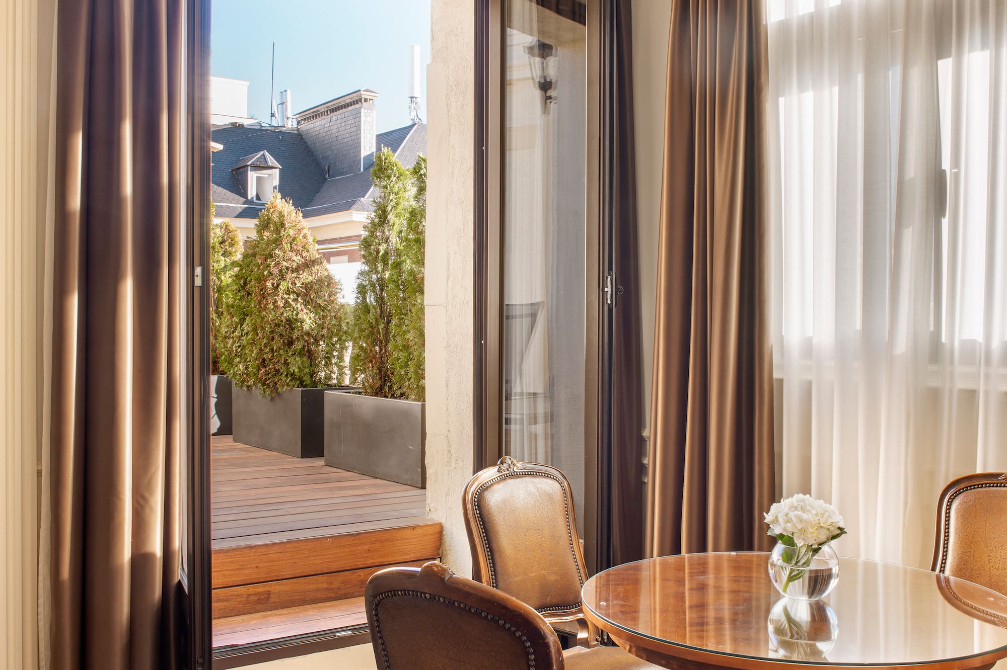 a room with a table and chairs