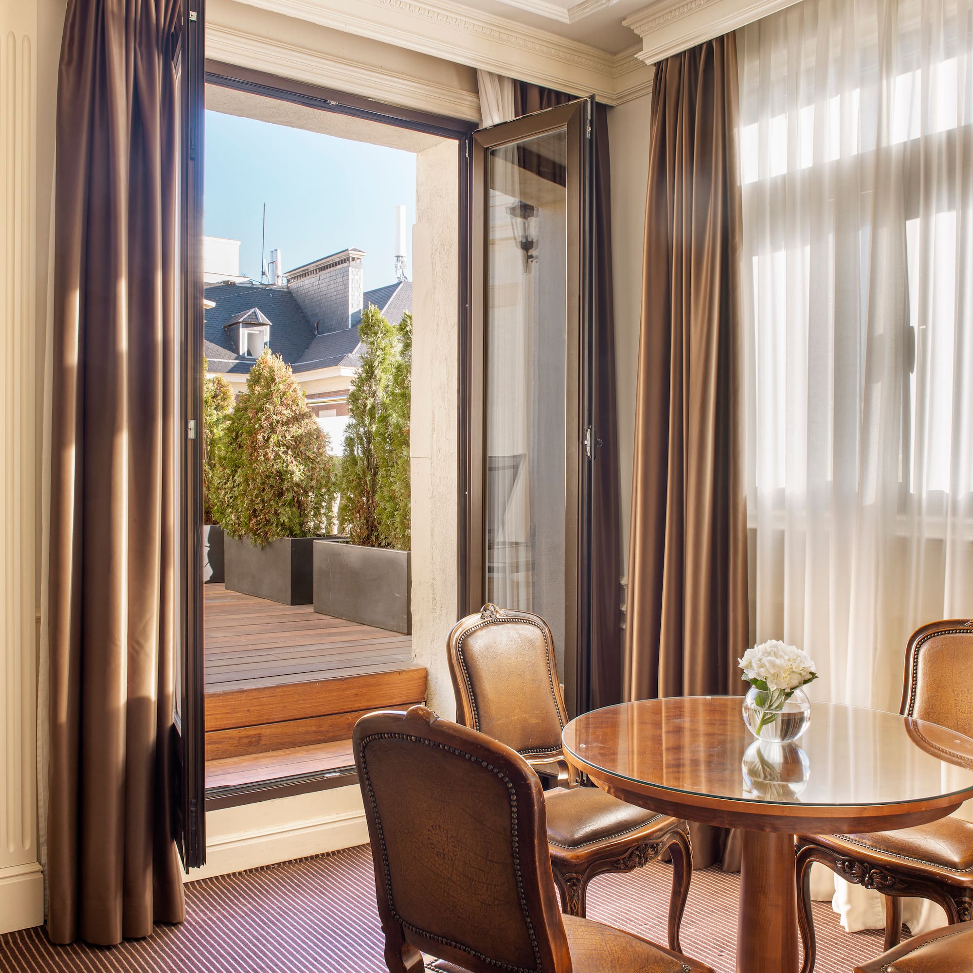 a room with a table and chairs