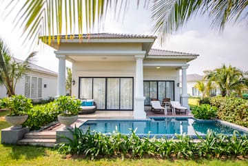 a pool in front of a house