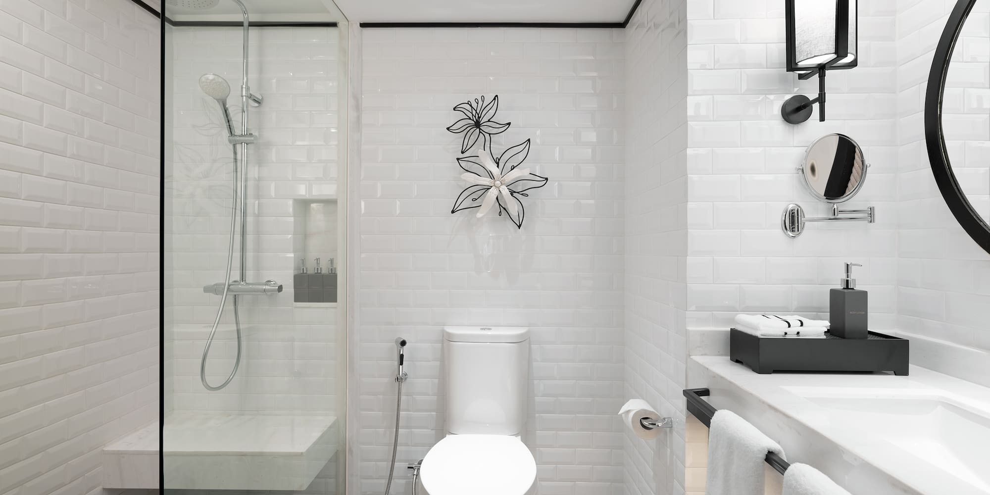 a bathroom with a toilet and shower