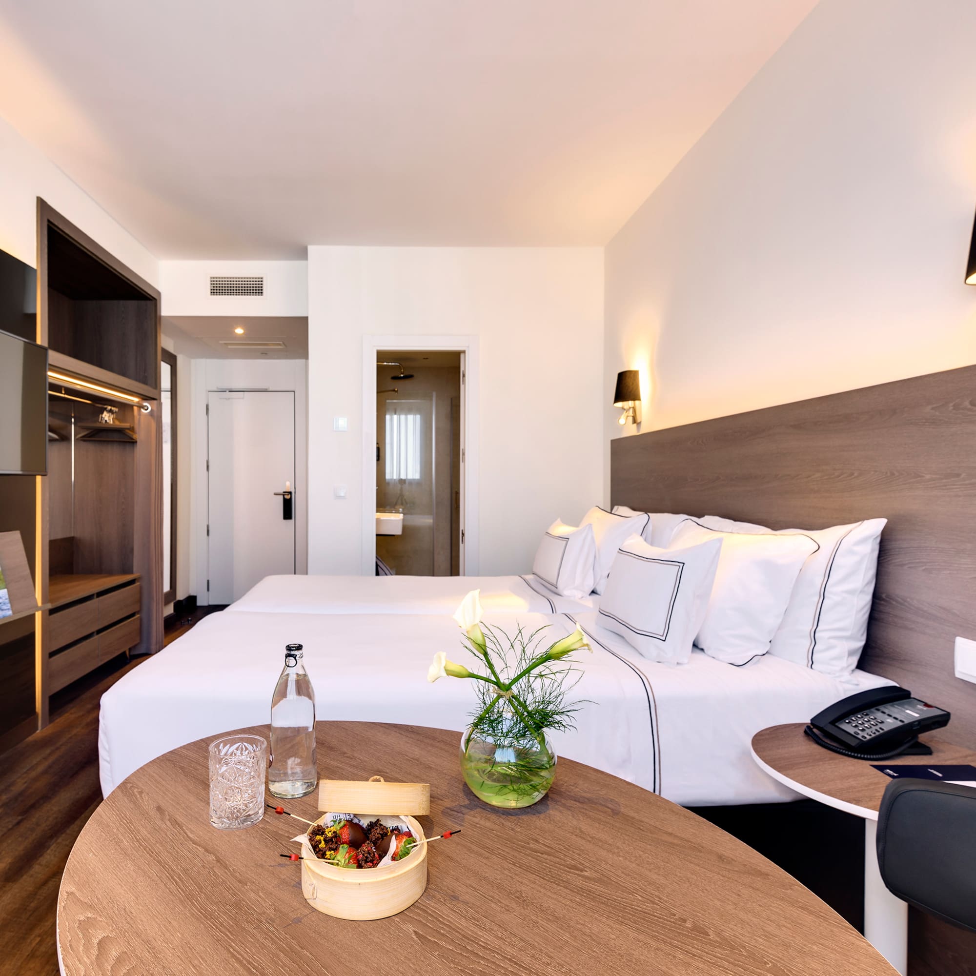 a room with a bed and a table