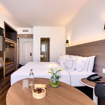 a room with a bed and a table