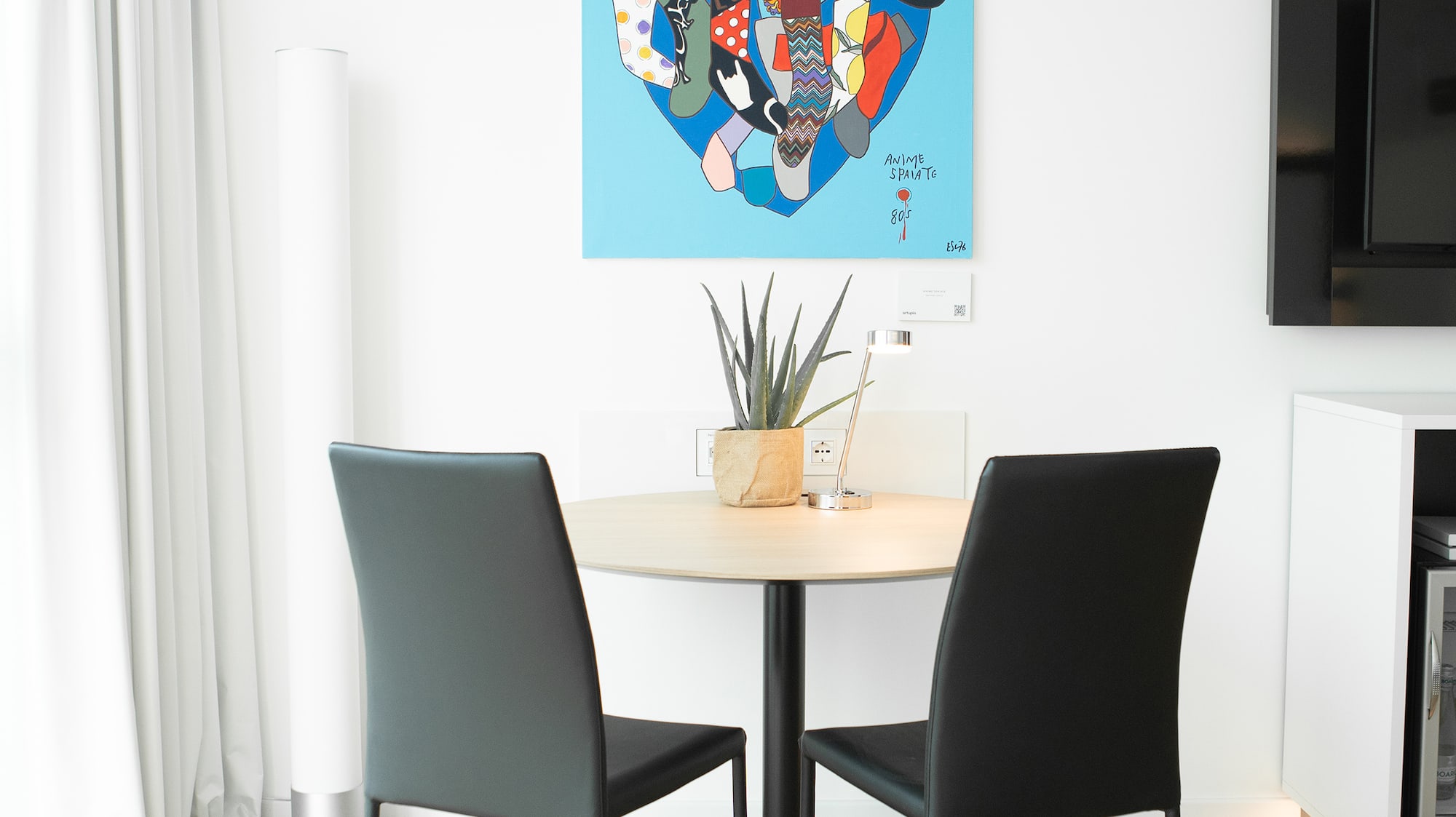 a table and chairs in a room