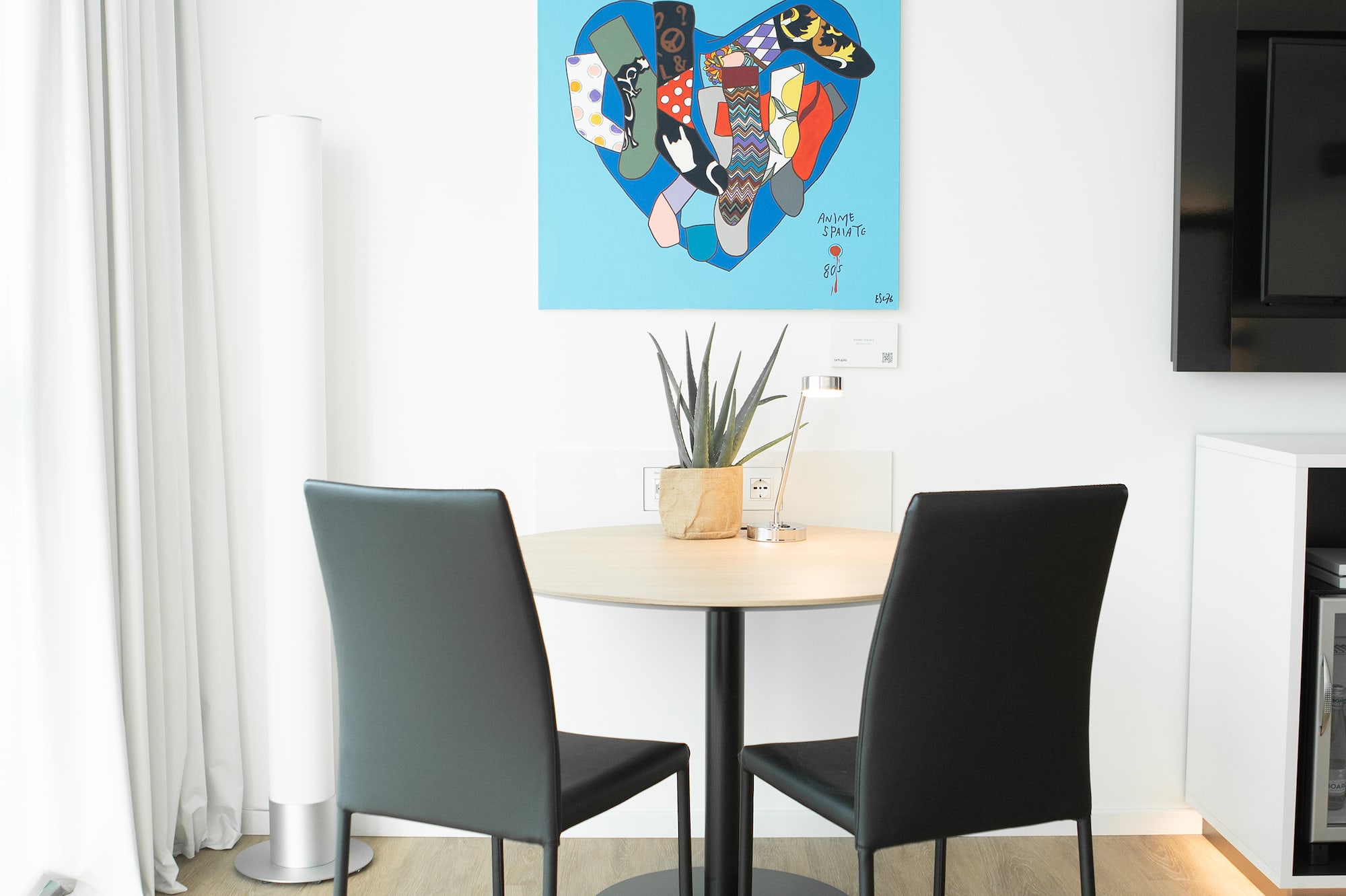 a table and chairs in a room