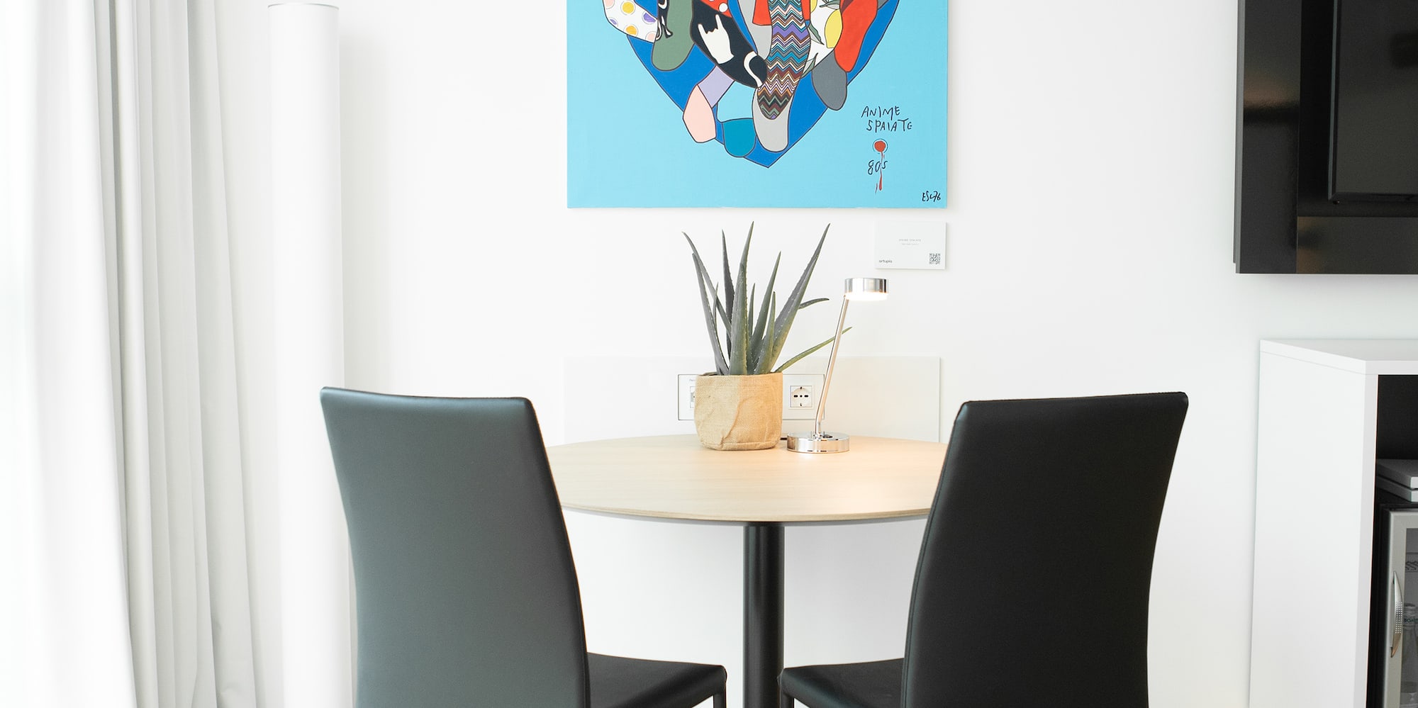 a table and chairs in a room
