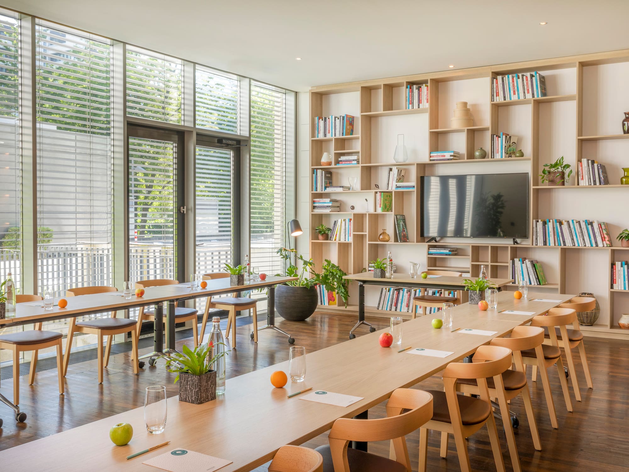 a room with a large table and chairs