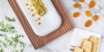 food on a plate next to a plate of food