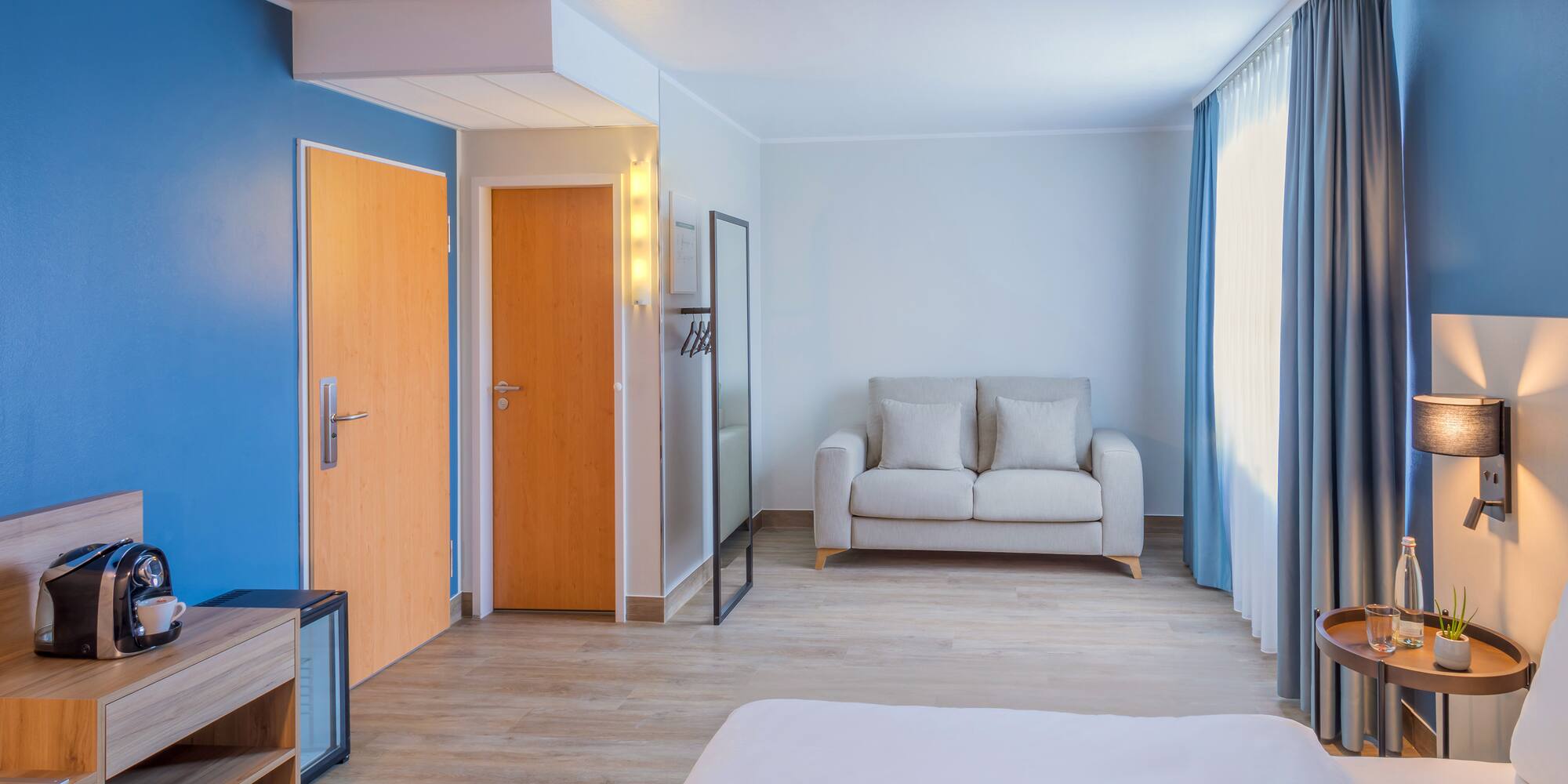 a room with a bed and a couch