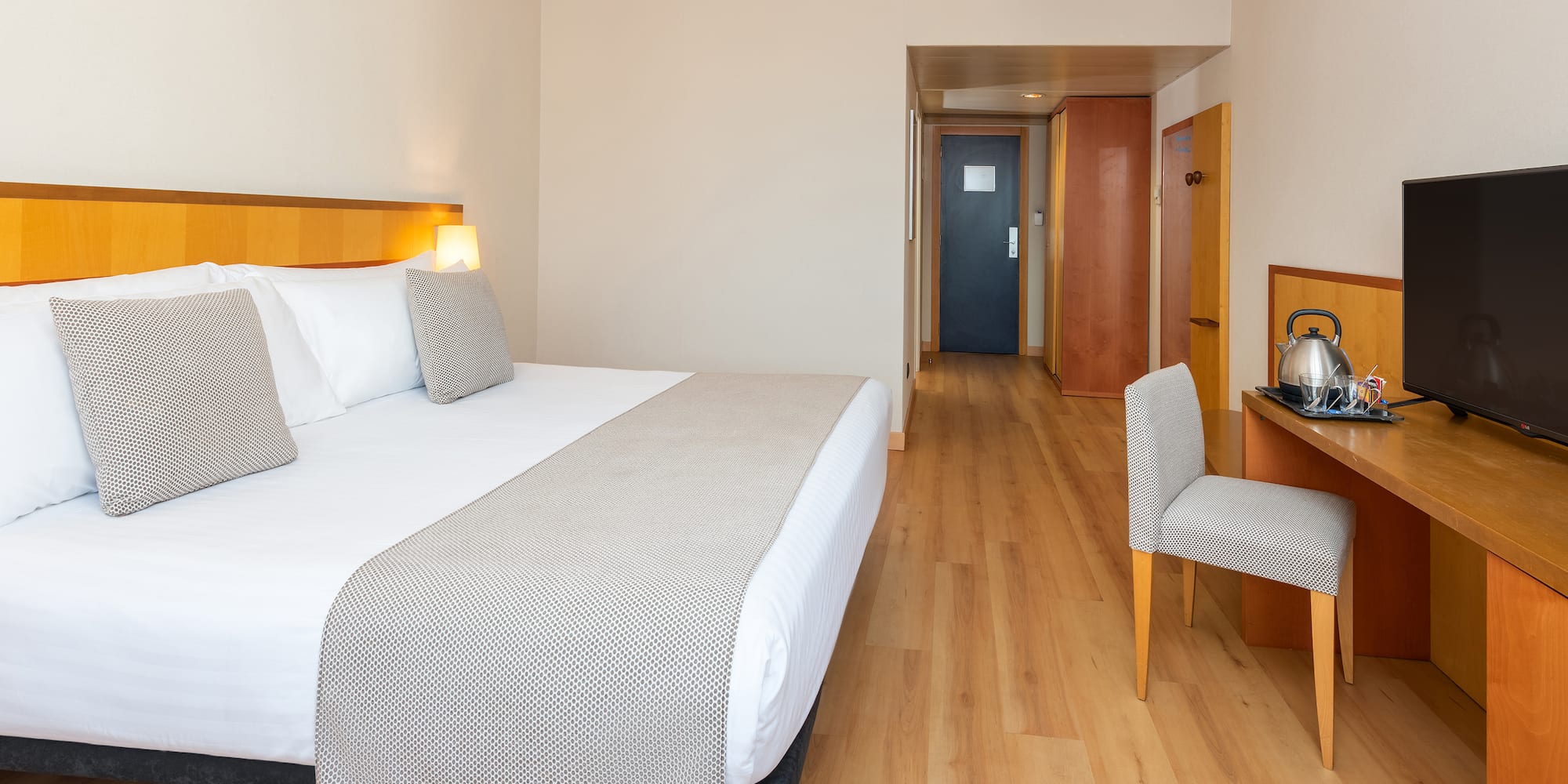 a room with a bed and a chair