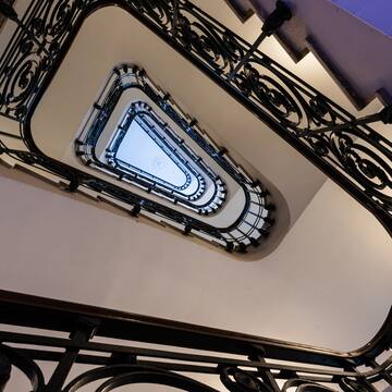 a staircase with a triangle shaped staircase