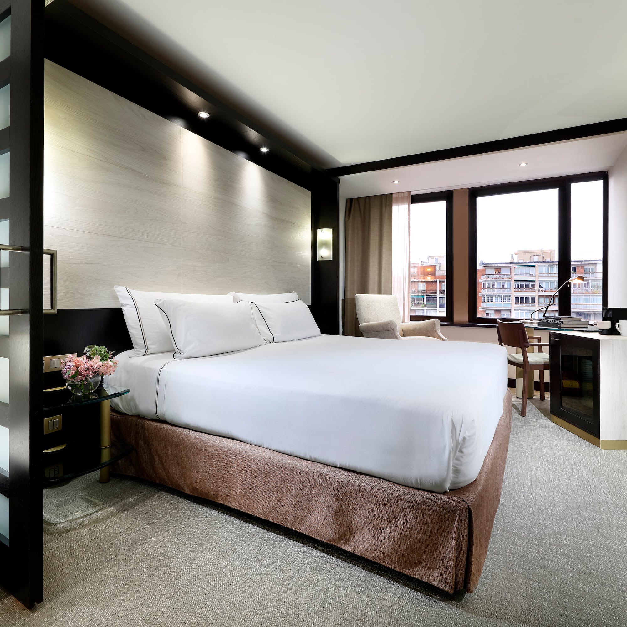 a room with a bed and a desk