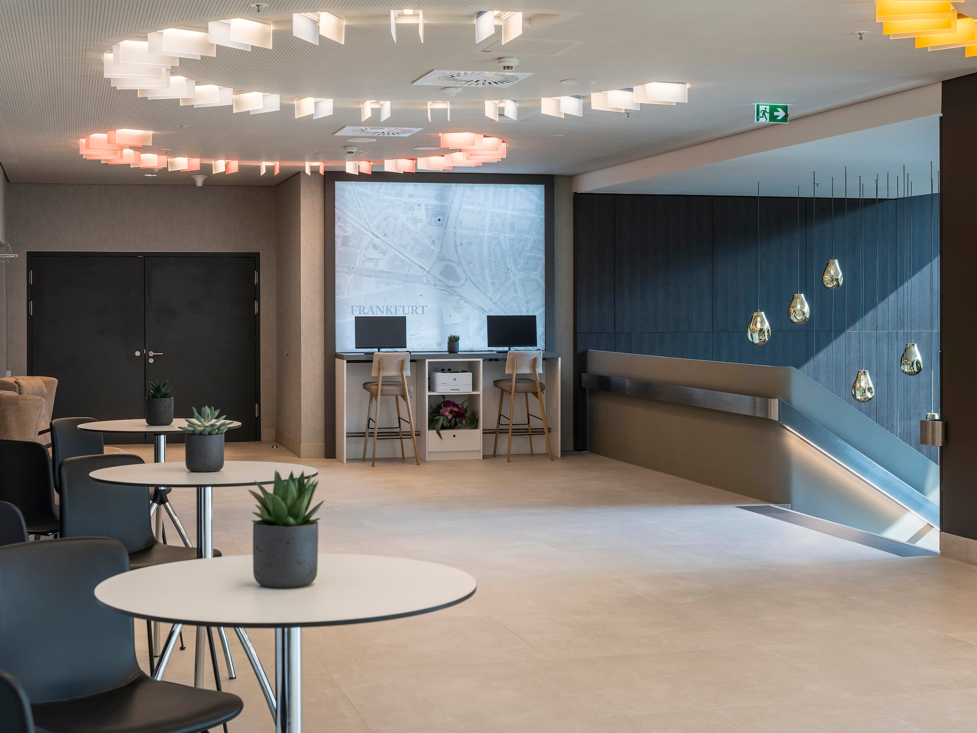 a room with chairs and tables