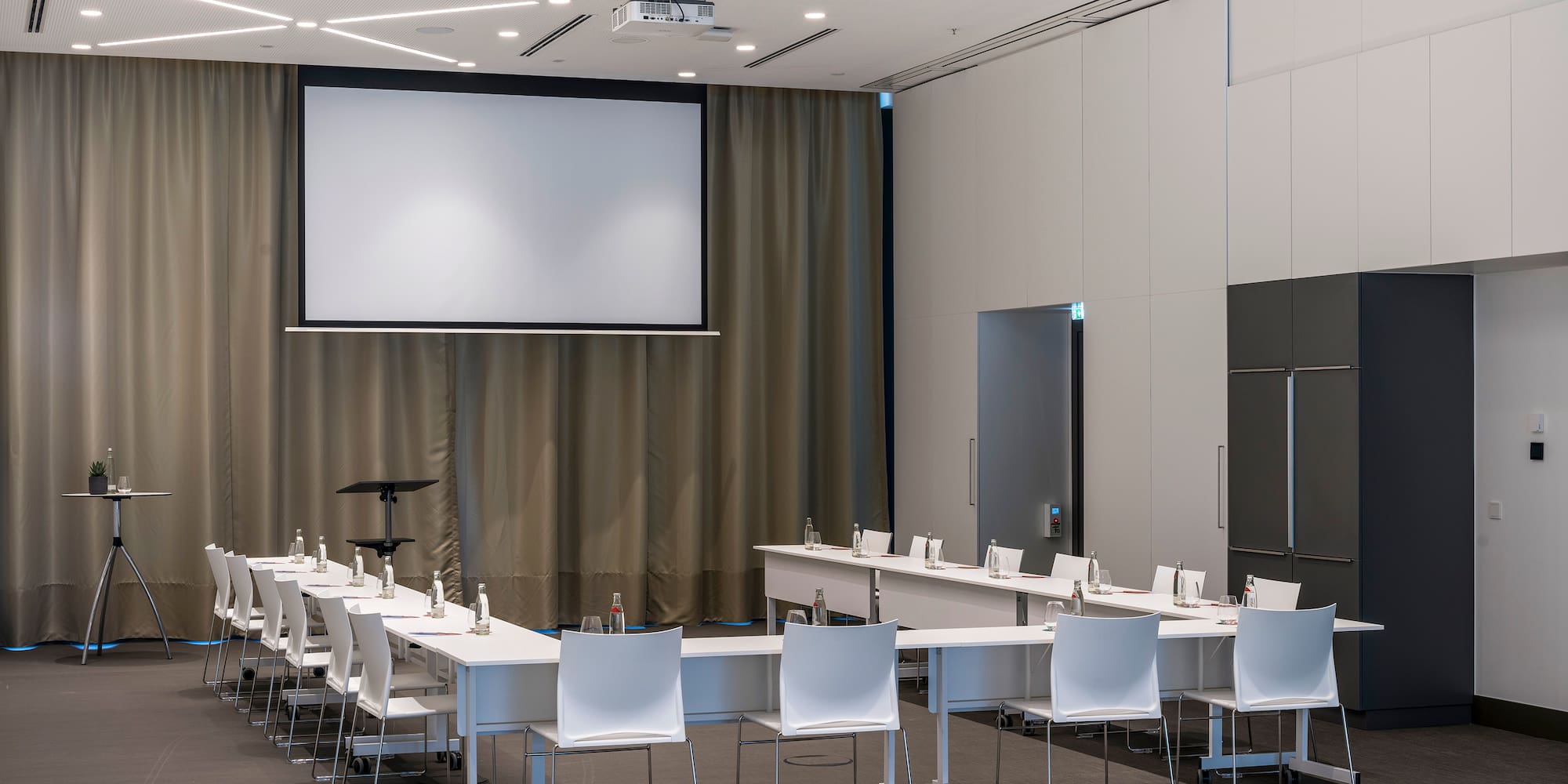 a room with a large screen