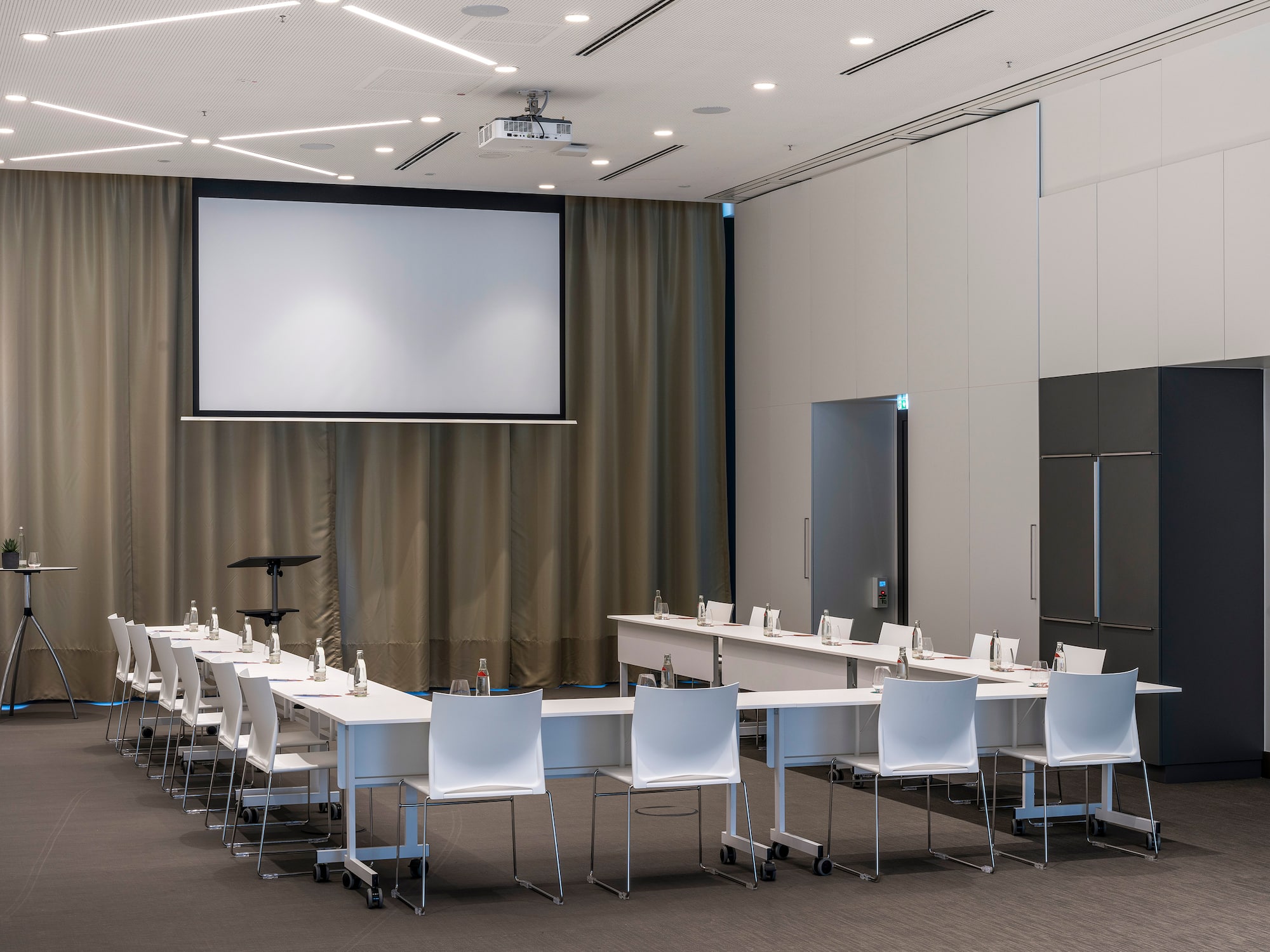 a room with a large screen