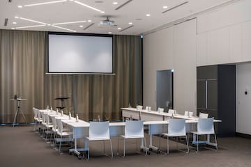 a room with a large screen