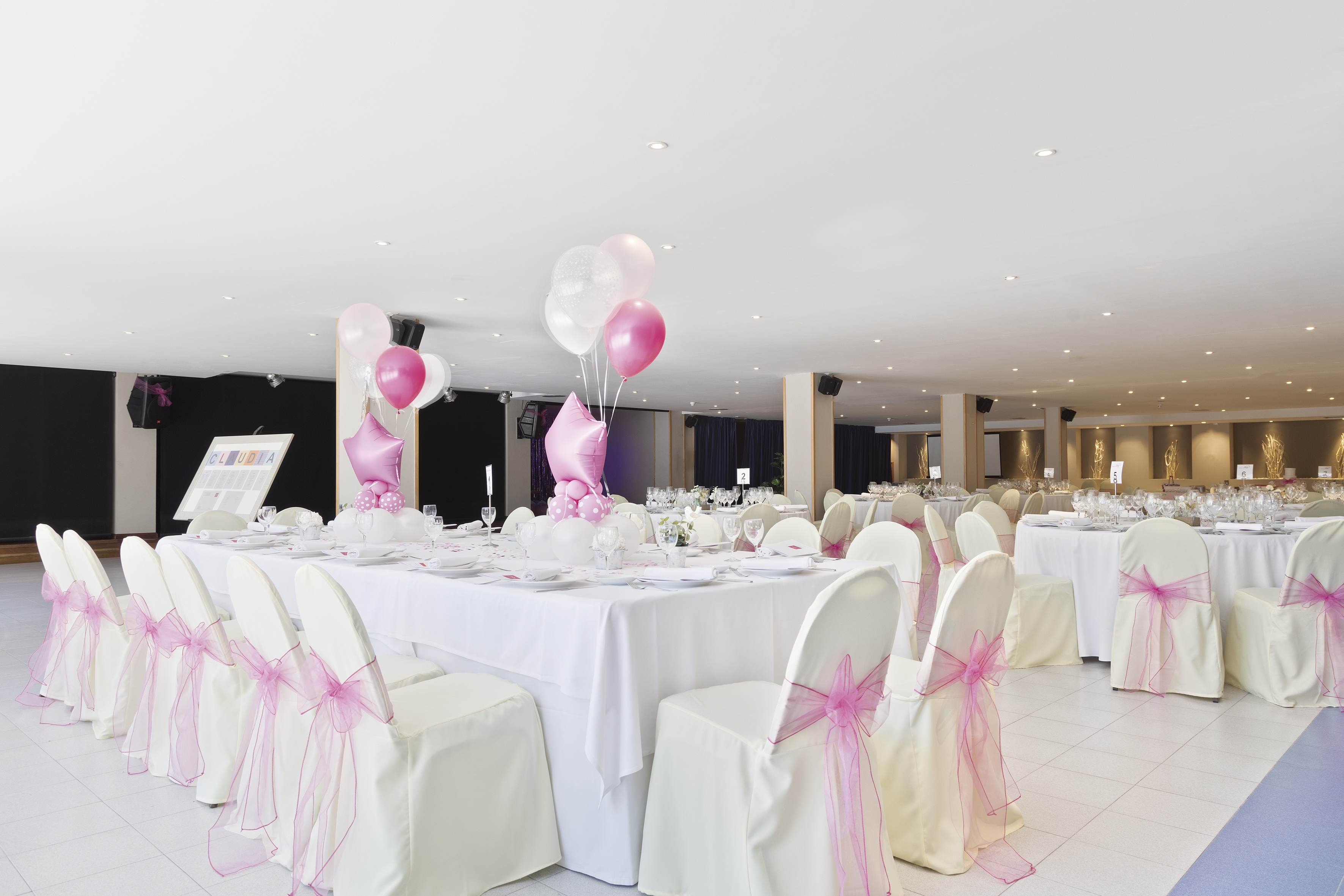 a room with tables and chairs