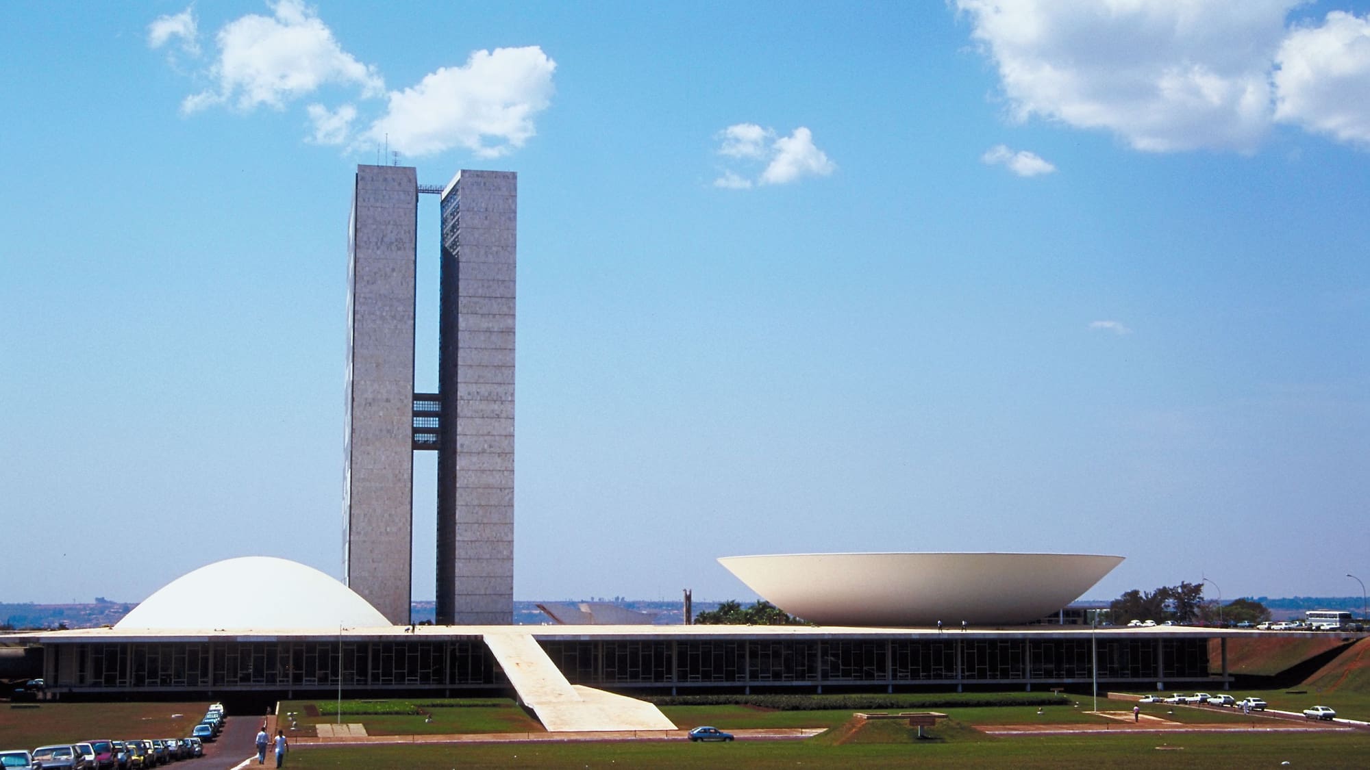a building with a large white dome and a large white bowl