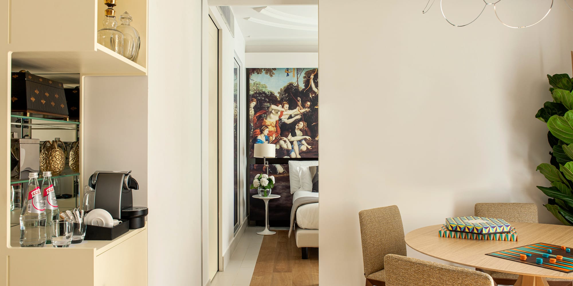 a room with a table and chairs