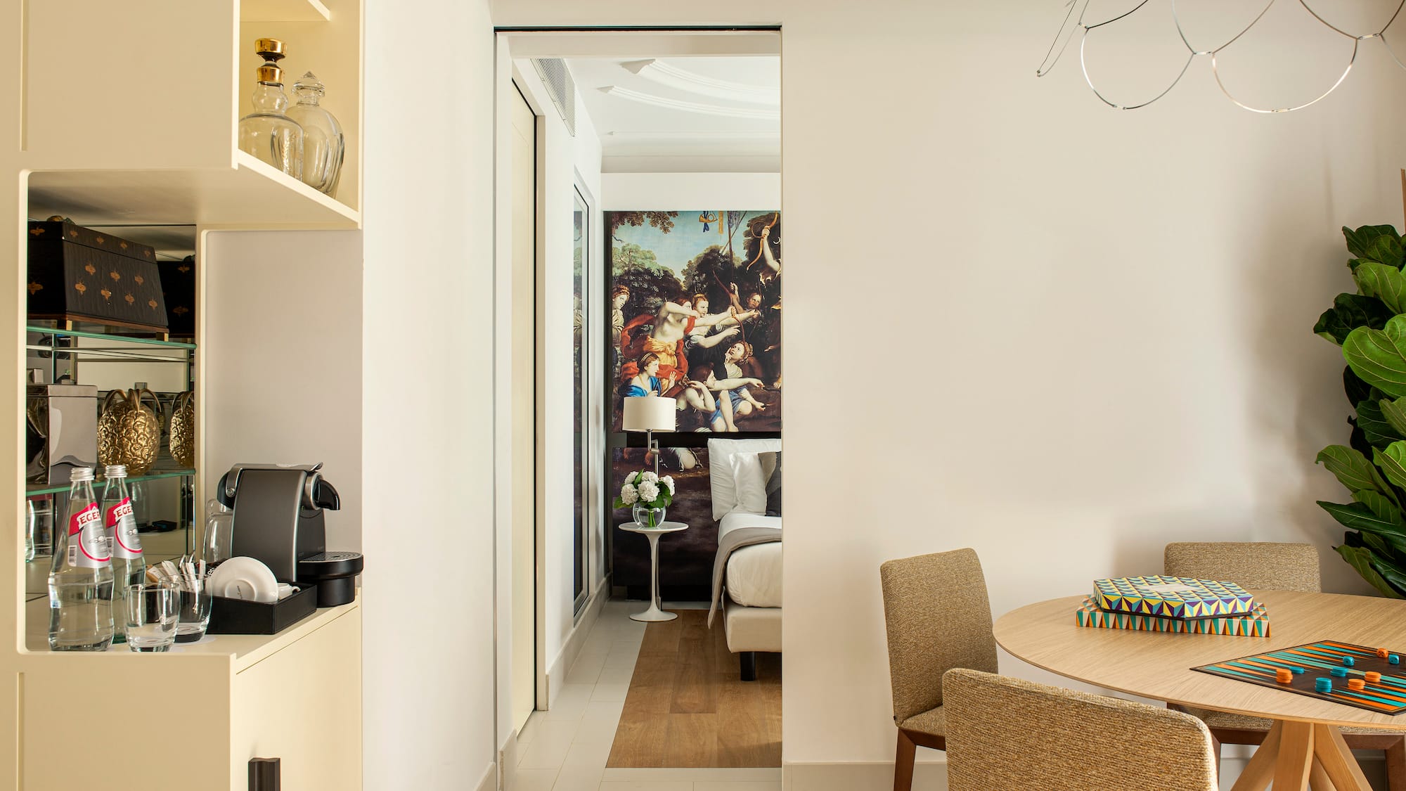 a room with a table and chairs