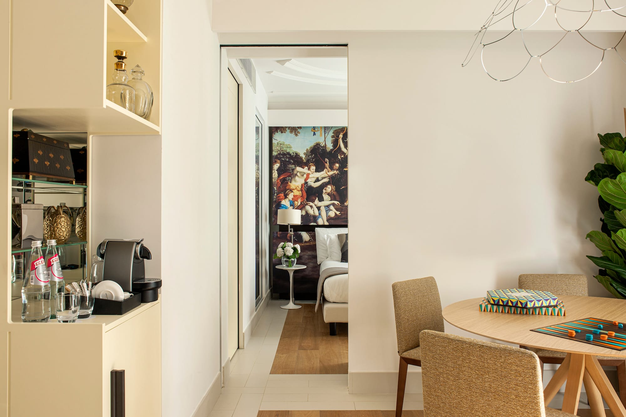 a room with a table and chairs