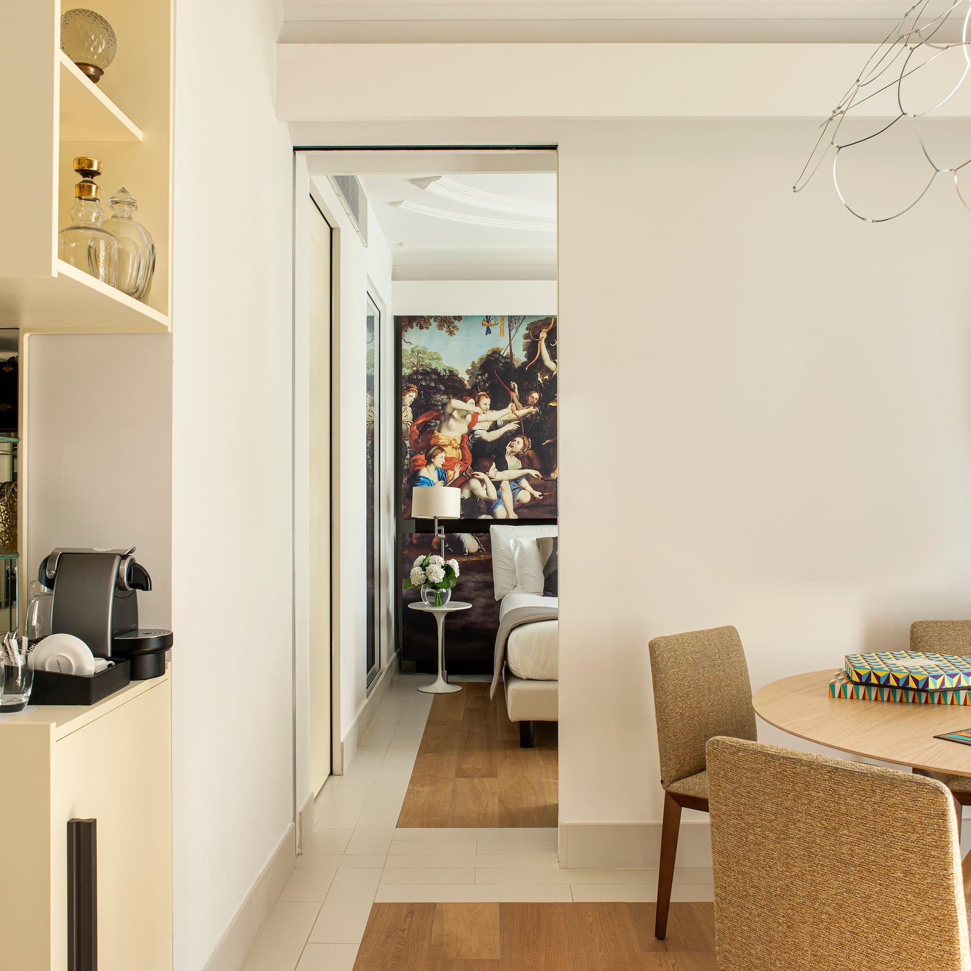 a room with a table and chairs