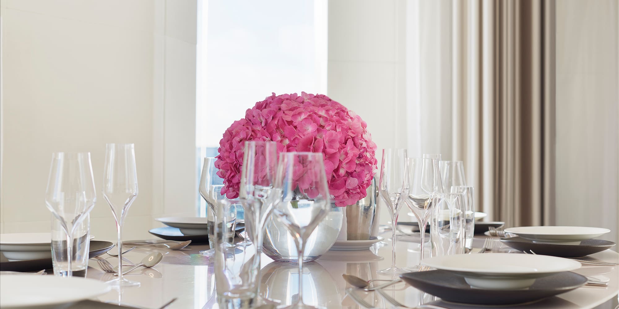 a table with plates and glasses