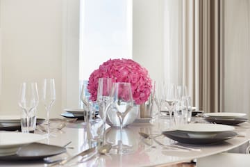 a table with plates and glasses