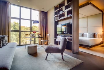 a room with a tv and a bed